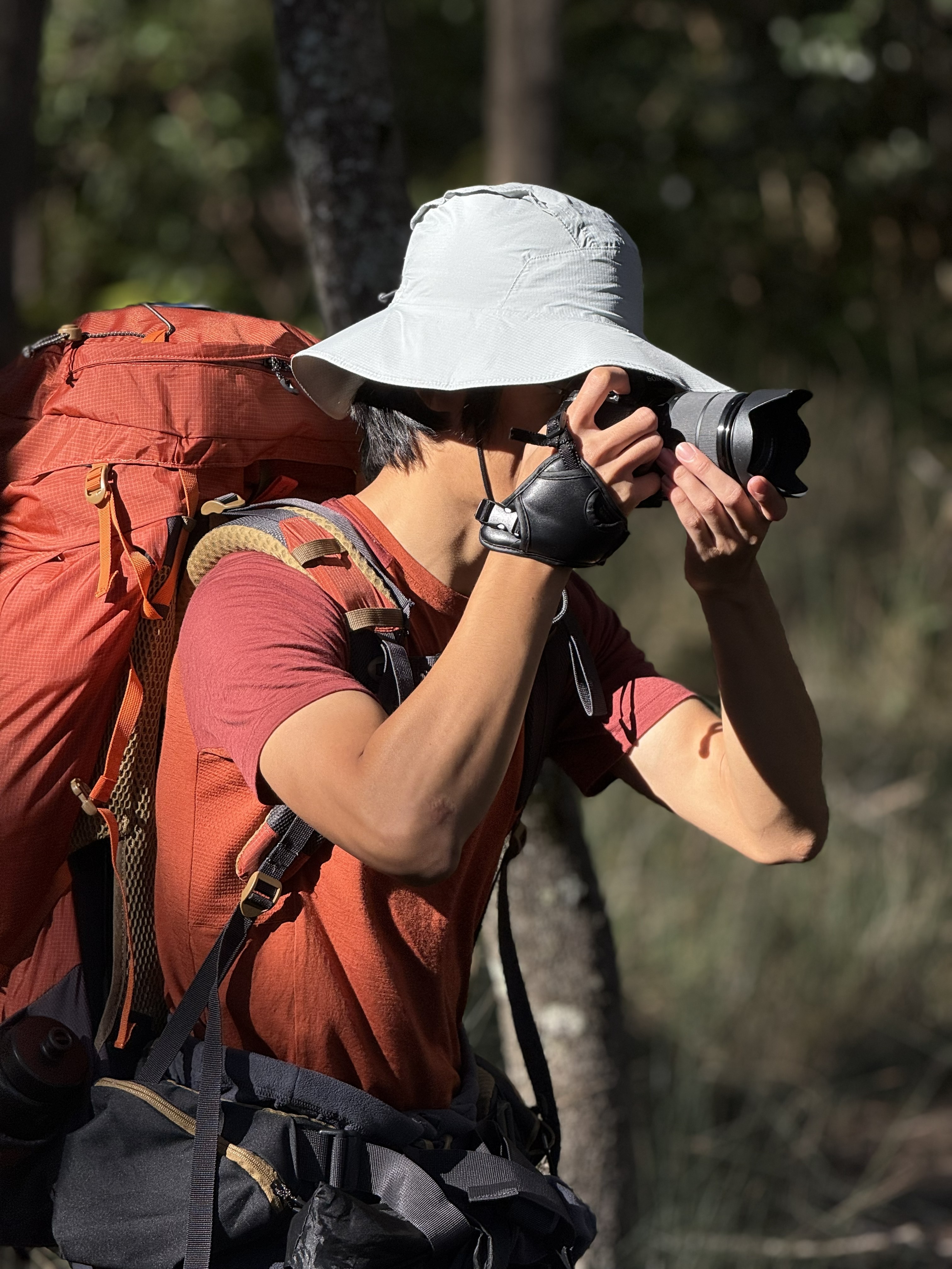 Weihang (Ian) Jin photographing outdoors